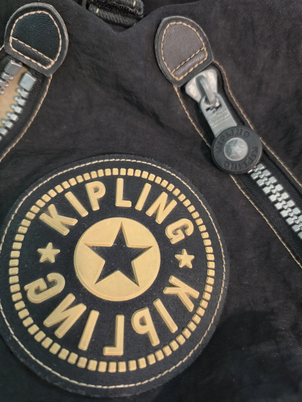 Vintage Kipling Black Canvas Drawstring Backpack with Gold Logo